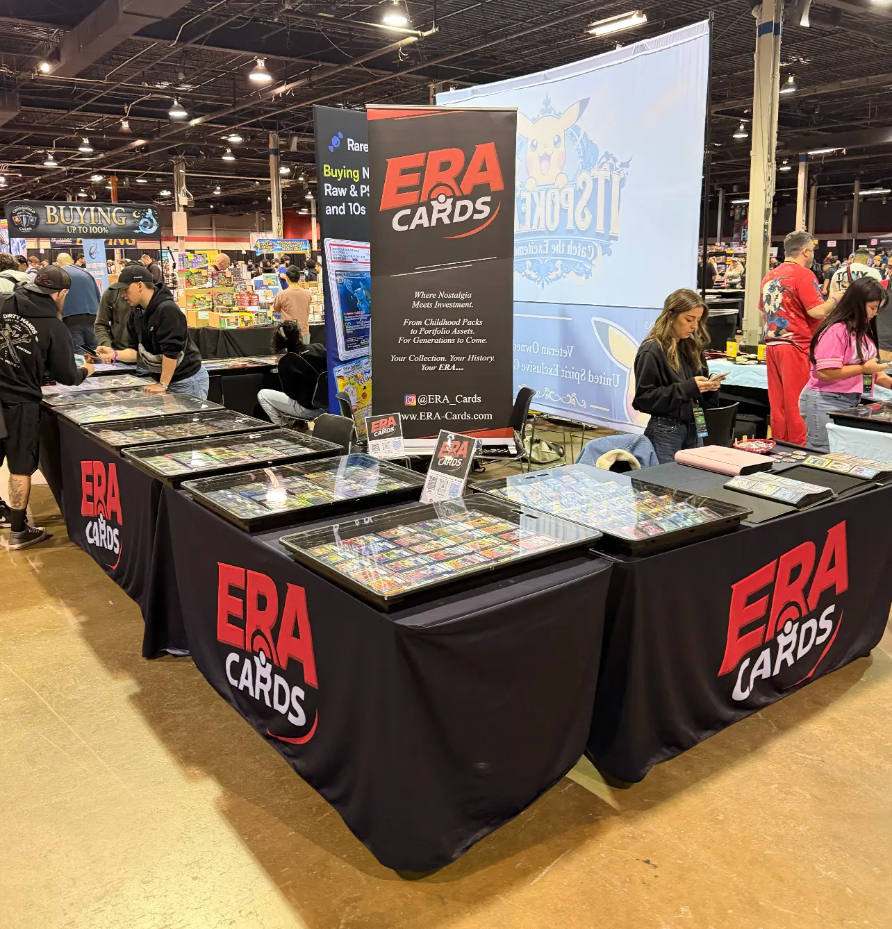 Collectors browsing the ERA Cards tables on a busy show floor